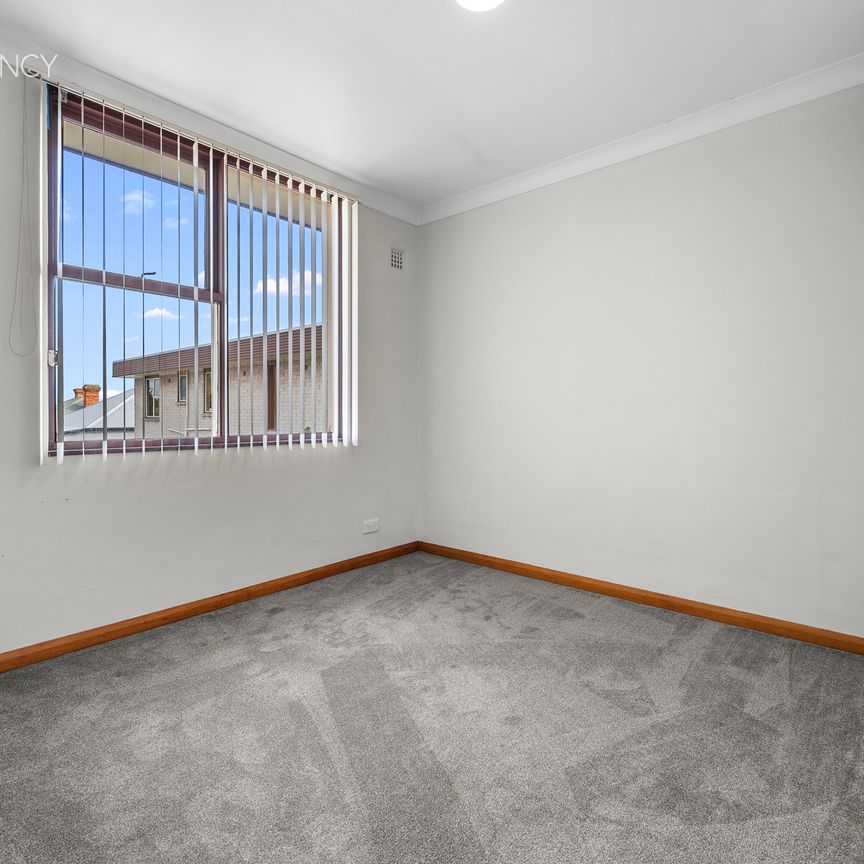 Top Floor, Prime Location, Easy Living! - Photo 1