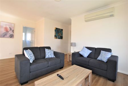 NEWLY RENOVATED FURNISHED UNIT - Photo 2