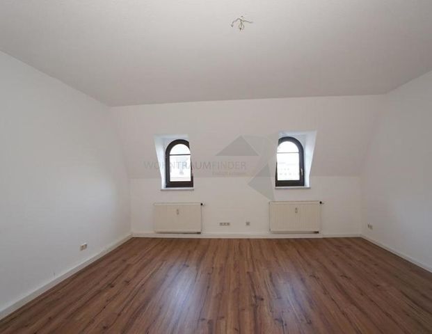 Gemütliche DG-Wohnung mit modernem Tageslichtbad und Balkon - Foto 1