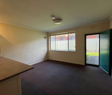 Neat and Tidy 3 Bedroom Unit! - Photo 1