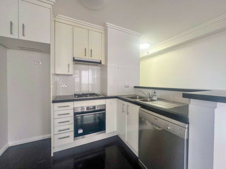 Conveniently Located Modern Unit! - Photo 3