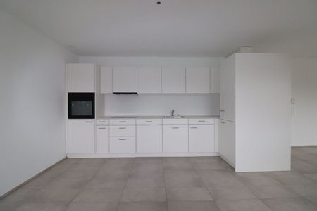 Nähe Dorfzentrum Reinach - moderne 2.5-Zimmer-Wohnung im DG - Foto 2