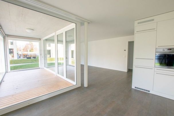 Appartement de 3,5 pièces au rez-de-chaussée avec coin salon dans le jardin - Photo 1