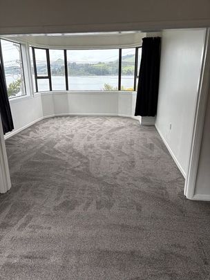 Charming 3BR Home with Courtyard & Deck - Photo 1