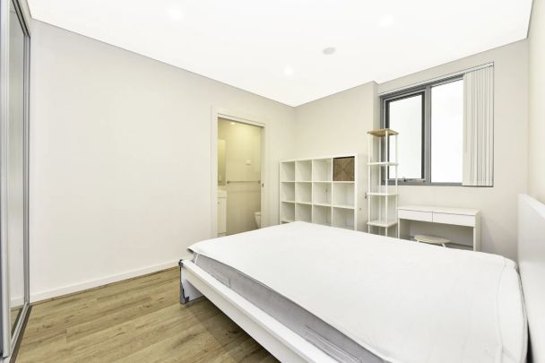 Top-Floor Penthouse with Dual Balconies | District Views - Photo 1