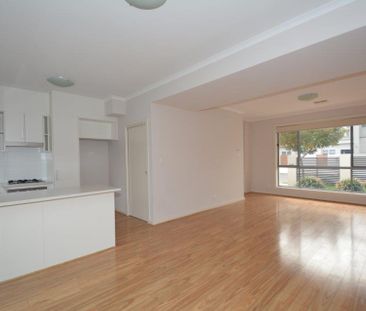 Low Maintenance Townhouse with Secure off Street Parking for 2 Cars! - Photo 1