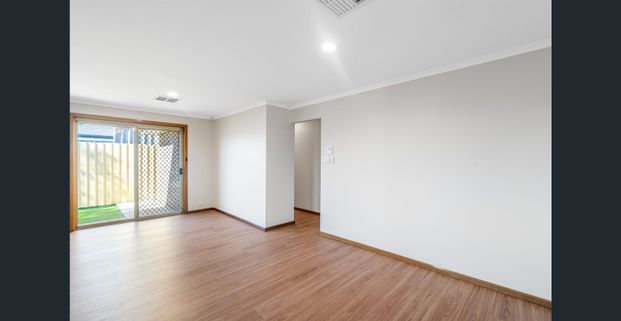 Spacious Family Living with Multiple Living Zones and Stunning Renovated Bathrooms - Photo 1