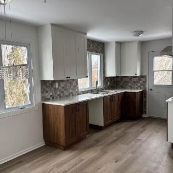 Grand 5 1/2 haut de duplex - Photo 1