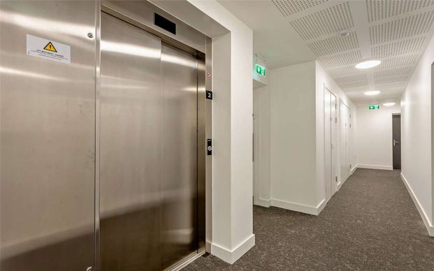 Brand-new one bedroom apartment in the popular Marleigh Park Development, with a private balcony and parking. - Photo 1