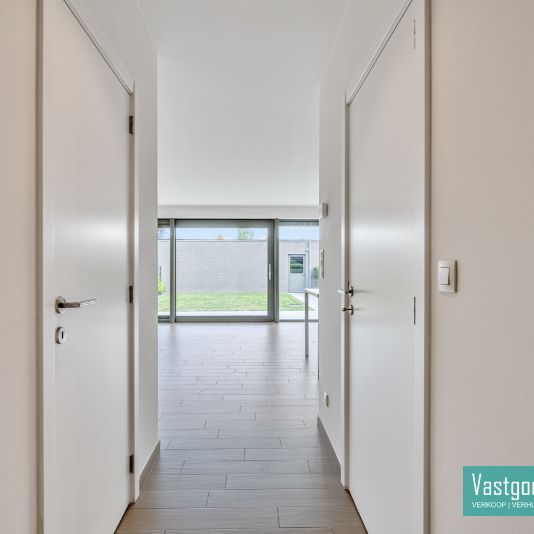 Gelijkvloersappartement met tuin en garage - Foto 1