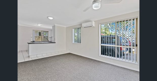 Air-Conditioned Townhouse in Central Location! - Photo 1