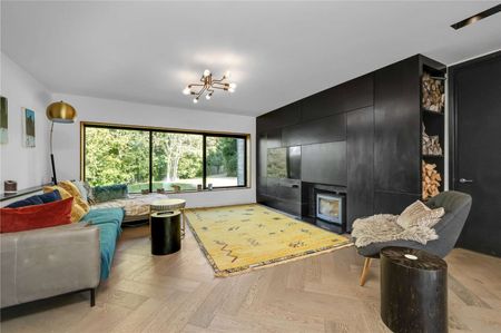 An impressive contemporary abode tucked away in a private elevated position with unrivalled country views. - Photo 2