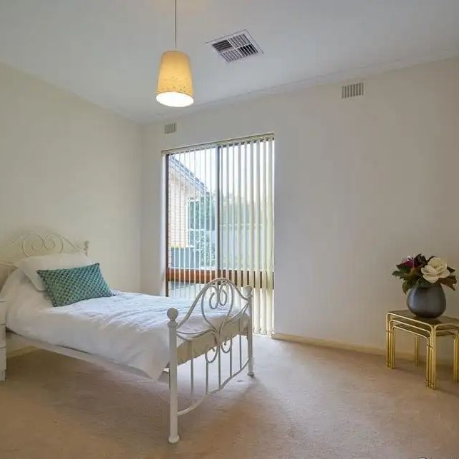 “Welcome to this spacious and secure courtyard homette near the CBD located at the rear of a small group of four.” - Photo 1