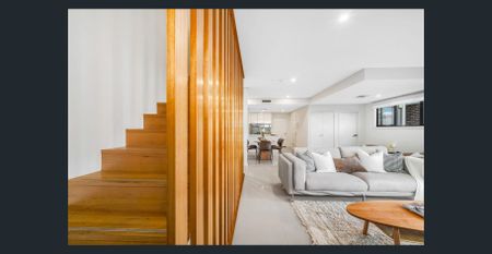 Contemporary Living Meets Coastal Charm – 3 Bedroom Retreat - Photo 2