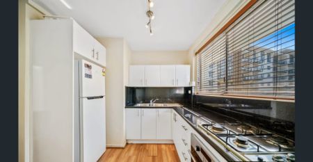 Modern 1x1 Apartment with River, City & Park Views - Photo 5