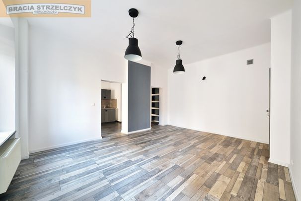 Klimatyczna, nowoczesna przestrzeń w kamienicy z 1897 roku. - Photo 1