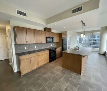 Luxury 2-Bedroom Condo with Downtown Views & Modern Amenities – Mov... - Photo 1