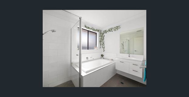 Stylish 4-Bedroom Home in Redbank – Walk to Schools & Shops! - Photo 1