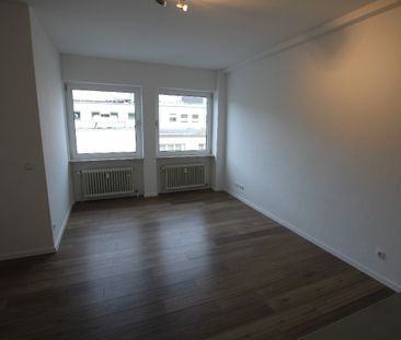 Appartement mit EBK in direkter Stadtmitte! Ab sofort - Photo 2