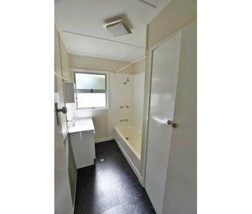 Spacious Family Home with Huge Yard, Side Access & Plenty of Storage! - Photo 1