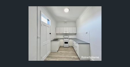 Beautifully Restored 1 Bedroom Unit In the CBD - Available 9.1.2026 - Photo 5