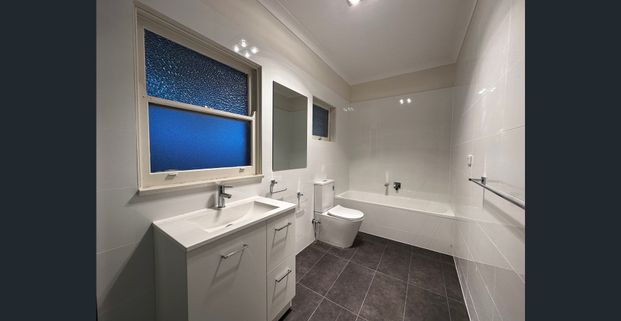 Refurbished and Charming Home with Modern Updates - Photo 1