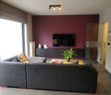 Gelijkvloersappartement met twee slaapkamers en binnentuin - Photo 1