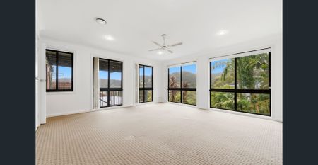 Elevated Coastal Living with Water Views and Space for the Whole Family - Photo 2