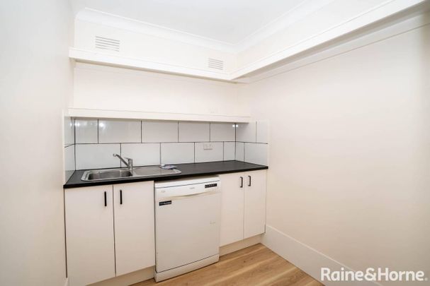 SPACIOUS & UPDATED FAMILY HOME IN PRIME CENTRAL LOCATION - Photo 1