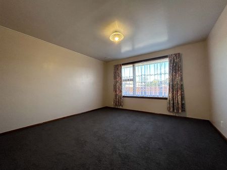 Two Bedroom Unit with Private Garden and Garage! - Photo 4