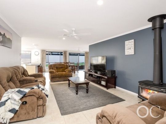 Open the Door To Family Living by the Coast - Photo 1