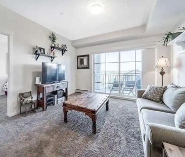 Beautiful 3rd Floor Condo with Stunning Pond Views | Calgary - Photo 1