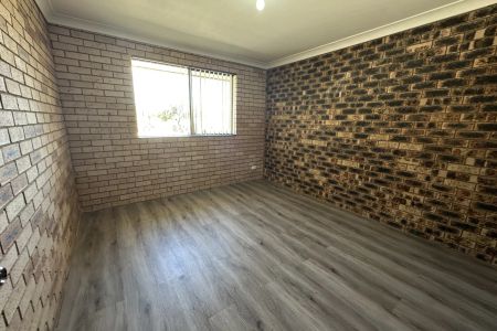 Solid Brick Family Home with Fenced Yard - Photo 4