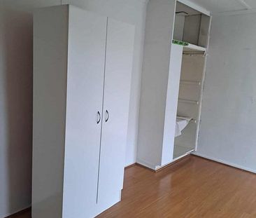 2 bedroom central with added storage rooms! - Photo 1