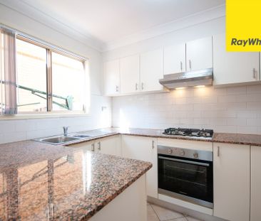 UPDATED STREET-FACING TOWNHOUSE WITH SPACE, STYLE & CONVENIENCE - Photo 5