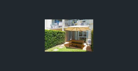 BEACHFRONT UNIT WITH PRIVATE COURTYARD - Photo 2