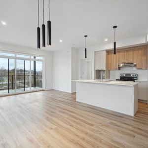 Superbe Condo 2 Chambres Avec 1.5/2 SDB - Photo 2