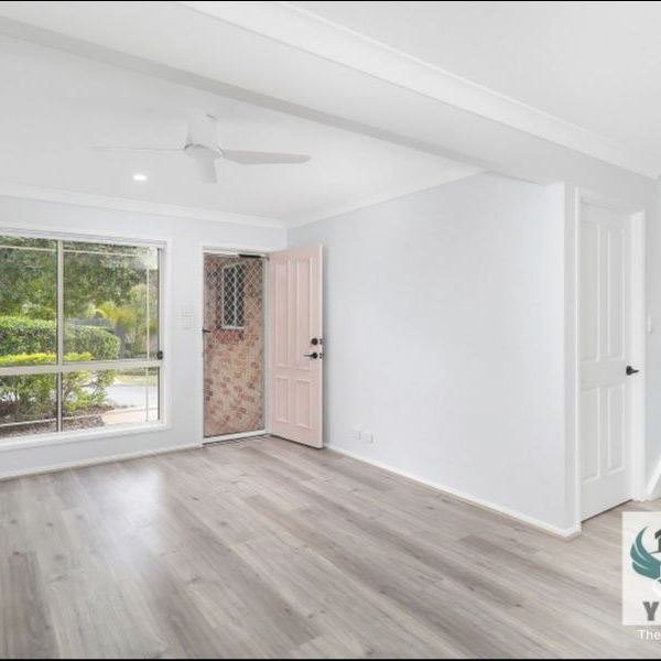 Modern 3-Bedroom Townhouse with New Kitchen & Floors + Big Yard - Photo 1