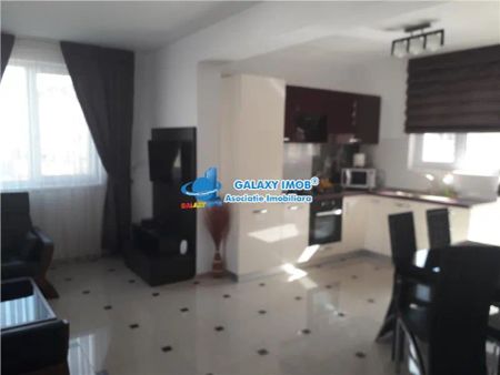 De inchiriat apartament de lux 2 camere fond nou cu parcare - Photo 2