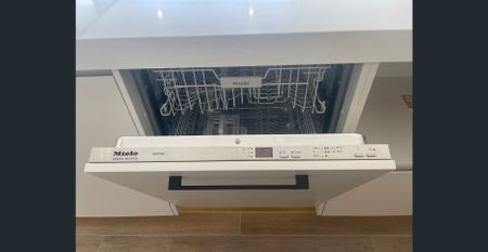 "Near New Two Bedroom Apartment with Timber Floors." - Photo 3