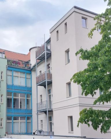 Charmante 3-Zimmer-Wohnung in Cottbus: Historisches Flair in moderner Sanierung - Photo 2