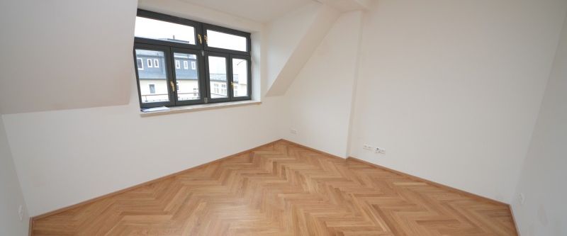 Traumhafte Wohnung im Dachgeschoss mit Balkon und Fußbodenheizung! - Foto 1
