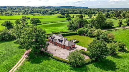 An exceptional architect designed residence set within a 0.75 acre plot, enjoying far-reaching countryside views and offering 3156 sq ft of contemporary living through. - Photo 2