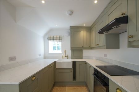 A beautifully refurbished brick and flint cottage combining charming period character with stylish, high-quality finishes throughout. - Photo 5
