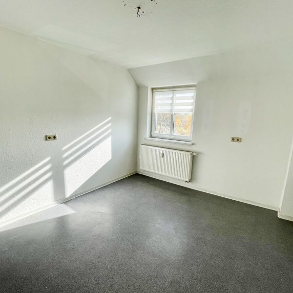 Geräumige 2-Raum-Dachgeschosswohnung in Deutscheinsiedel - Photo 1