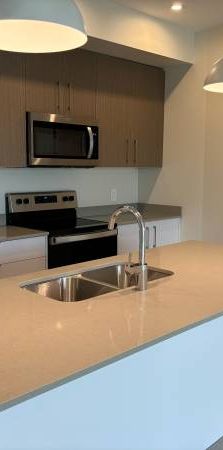 NEW UPTOWN RESIDENCES (2BR/2 Bath w/Den) - Photo 1