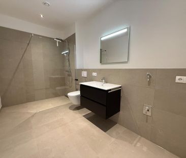 Bester Energiestandard! Moderne 1-Zi-Wohnung mit Balkon und Küche -... - Photo 4