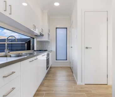 Stylish Near-New 2-Bedroom Home with Spacious Outdoor Living - Photo 2