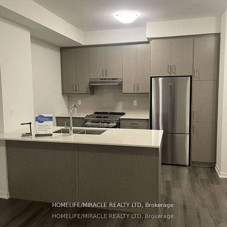 Hwy 7 & Interchange Way 2Bdrm Corner Twnhouse Designer Kitchen Spacio - Photo 1