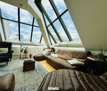 Außergewöhnliche Dachgeschoss-Maisonette mit Dachterrasse und beein... - Foto 5